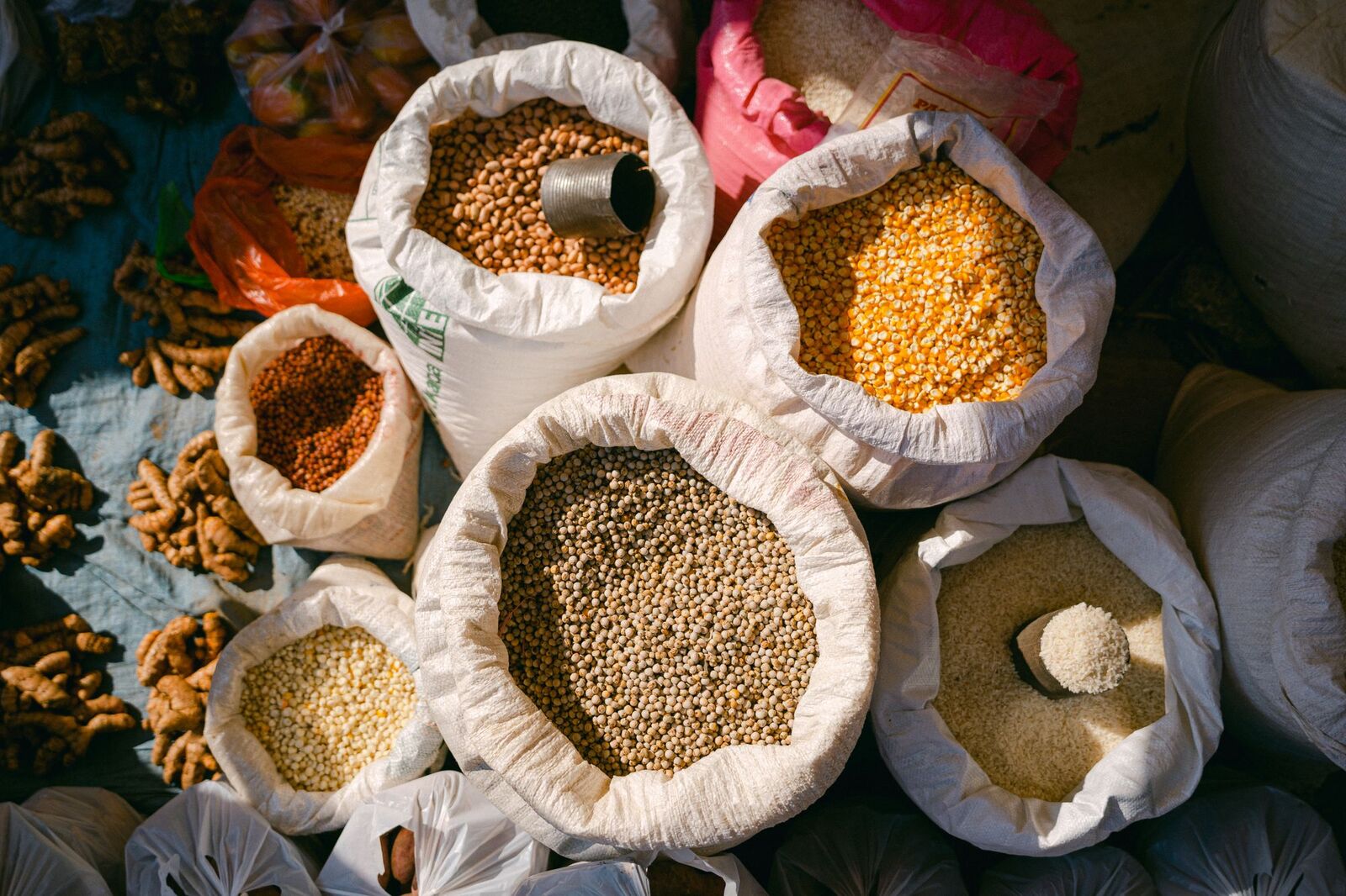 Sacks of grains and pulses at a wholesale market